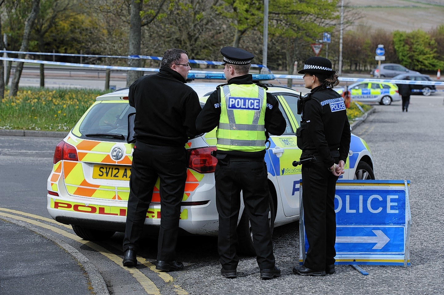 Police search the land at Nigg Way, Aberdeen. Picture by Kenny Elrick