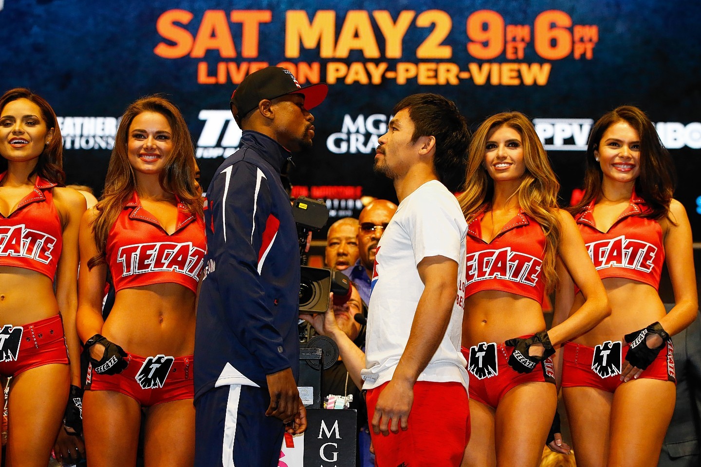 Floyd Mayweather Jr. and Manny Pacquiao face off during the official weigh-in