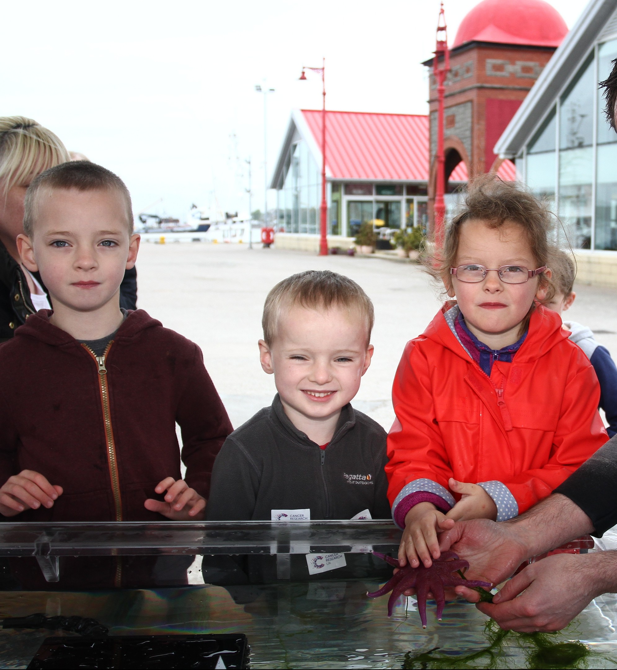 Joseph Christie,5, Michael Christie, 4, and Kerry Thomson, 6, meet a sunstar