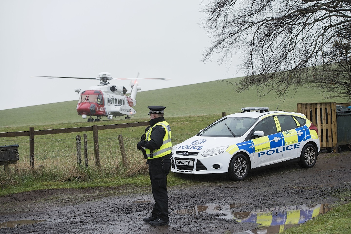 Police and coastguard at the crash site near Abernyt