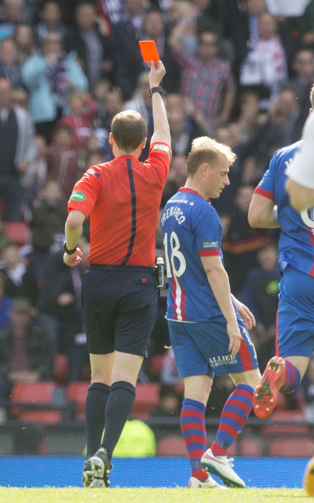 Carl Tremarco is sent off by referee Willie Collum