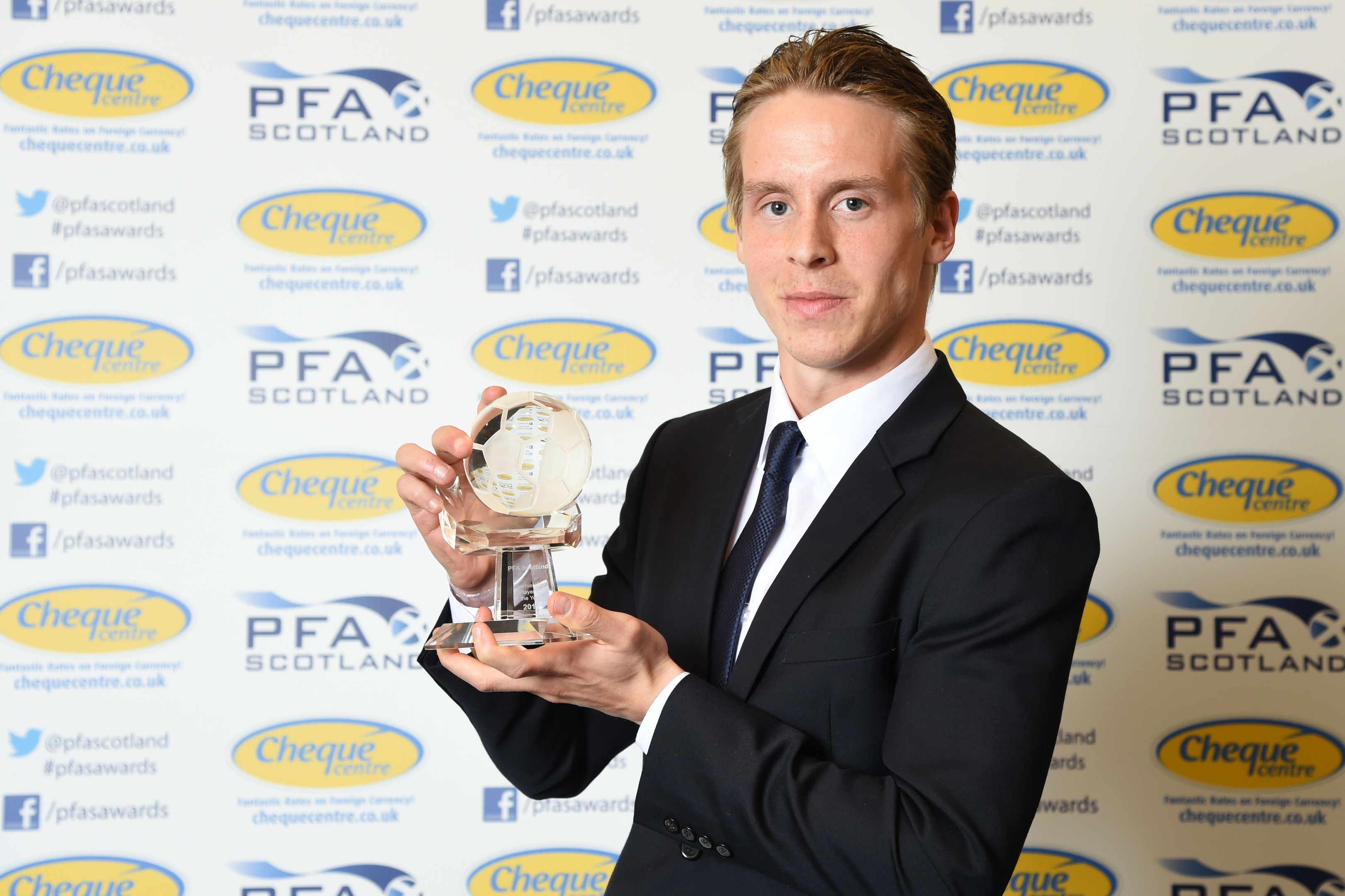 Celtic's Stefan Johansen poses with the PFA Scotland Player of the Year award 