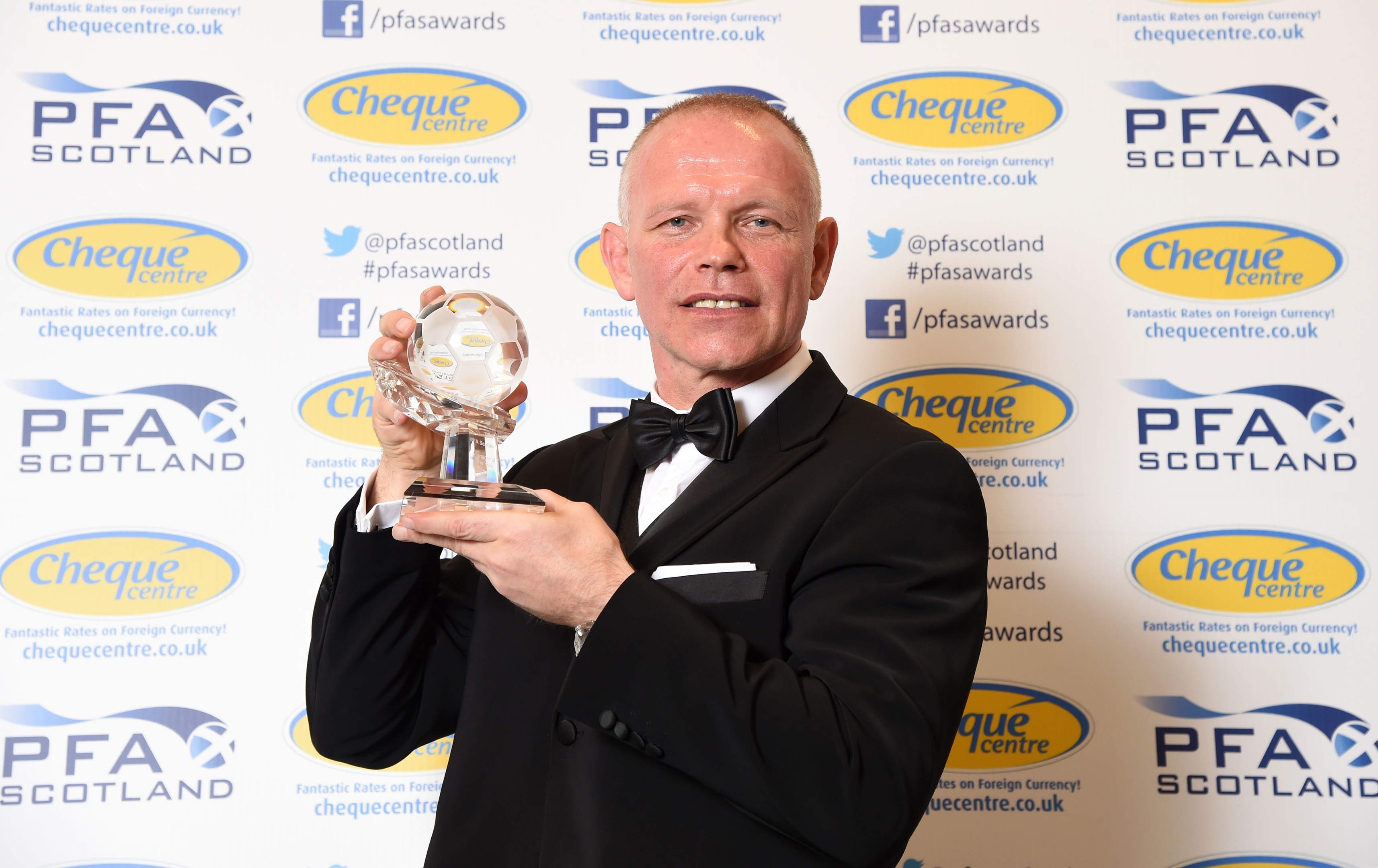 Manager John Hughes collects the PFA Scotland Manager of the Year award 