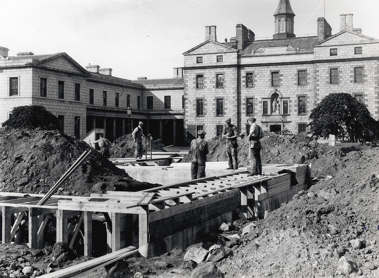 Workmen construct air raid shelters in the grounds of Robert Gordon's College.