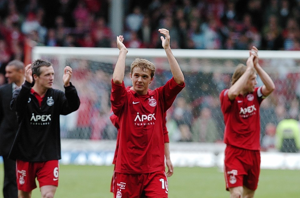 Russell Anderson alongside  Darren Mackie and Scott Severin