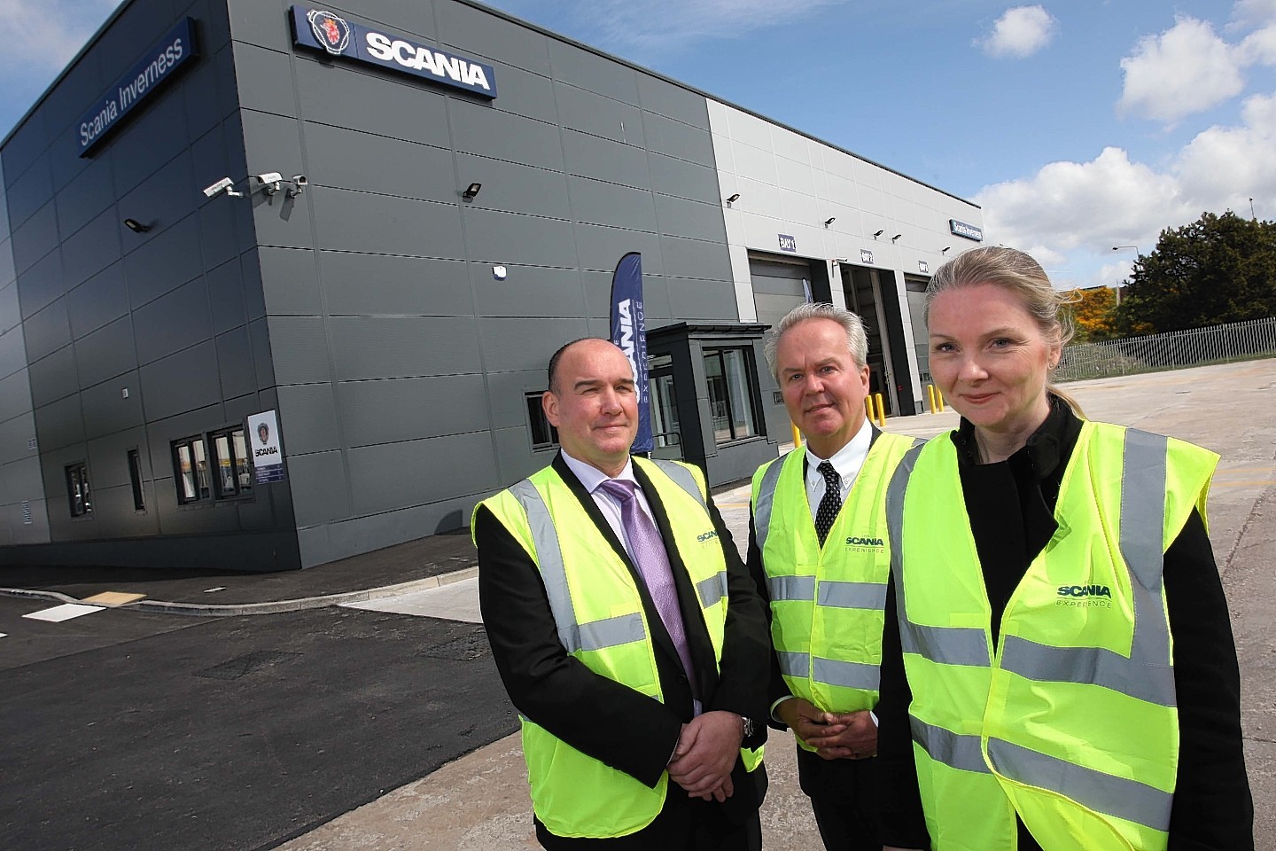 L-R Scania Inverness general manager Iain Duncan, Scania GB managing director Claes Jacobsson and Swedish Ambassador Nicola Clase