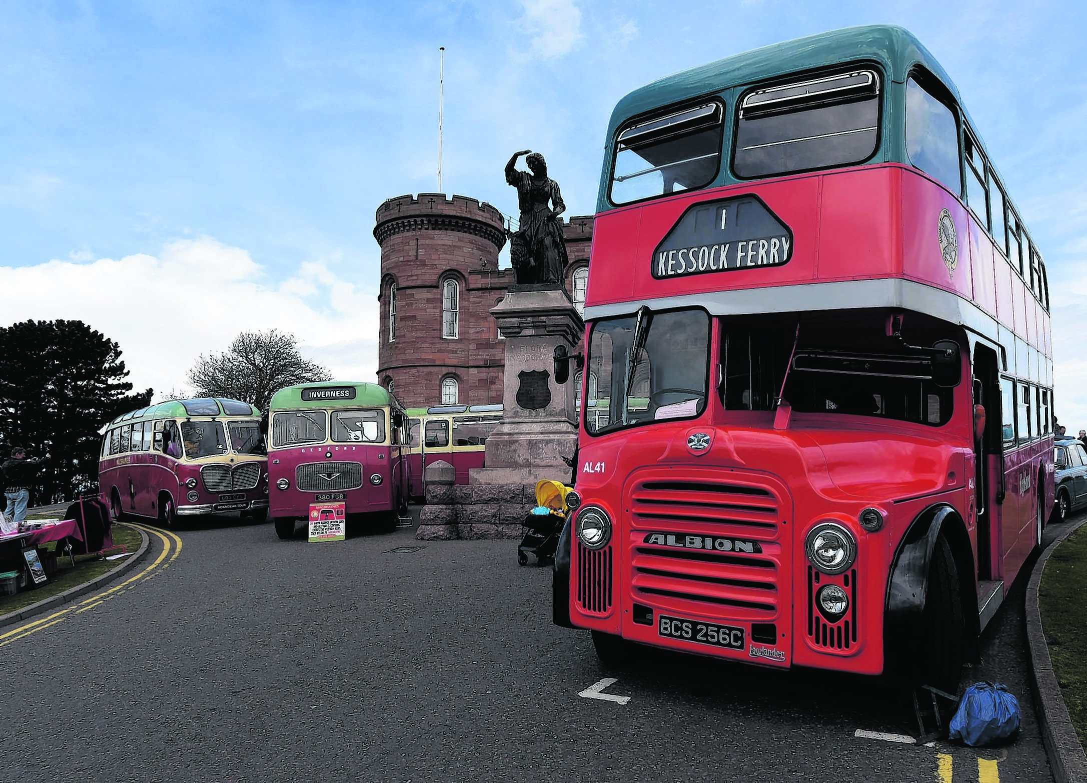 A fleet of buses at Inverness Castle. The double decker left Inverness 1968 and is now resident in the Scottish Vintage Bus 