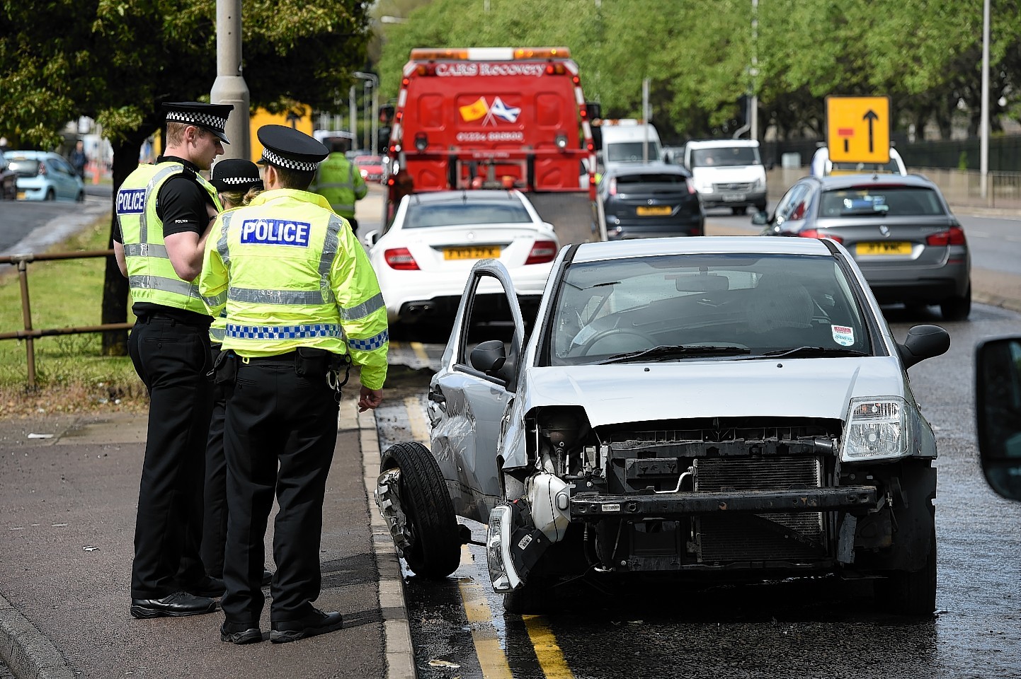 Police Scotland at the scene of an accident on the Ellon Road at Bridge of Don, close to the areas Barbers Pole hairdresser.

Picture by KENNY ELRICK     02/06/2015