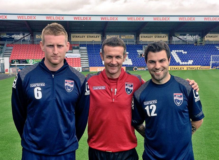 Manager Jim McIntyre with two of his new signings, Chris Robertson and Ricky Foster