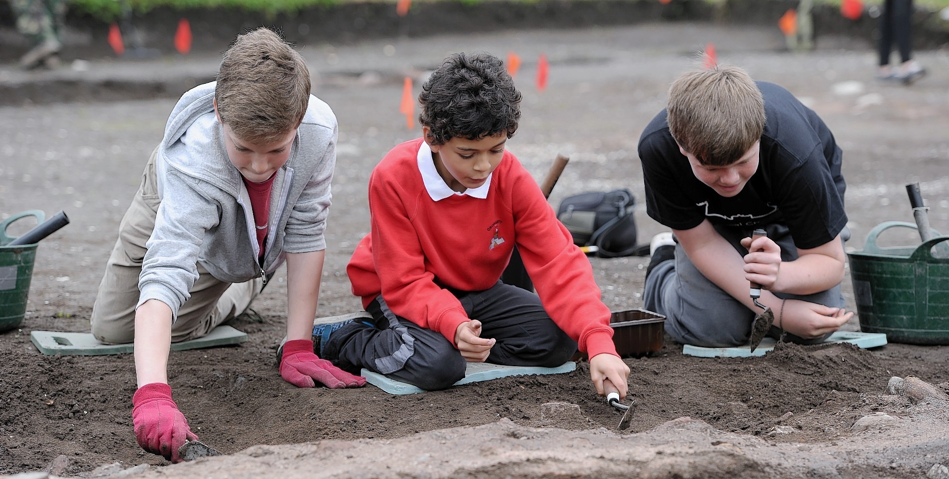 Pupils of Cromarty Primary School and Fortrose Academy at work yesterday on the Cromarty  archaeological dig