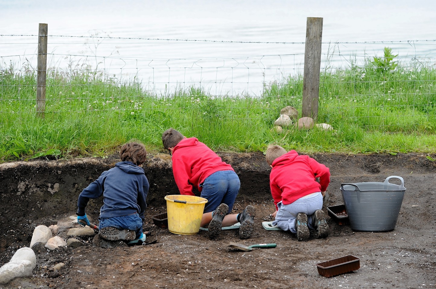 Pupils of Cromarty Primary School and Fortrose Academy at work yesterday on the Cromarty  archaeological dig
