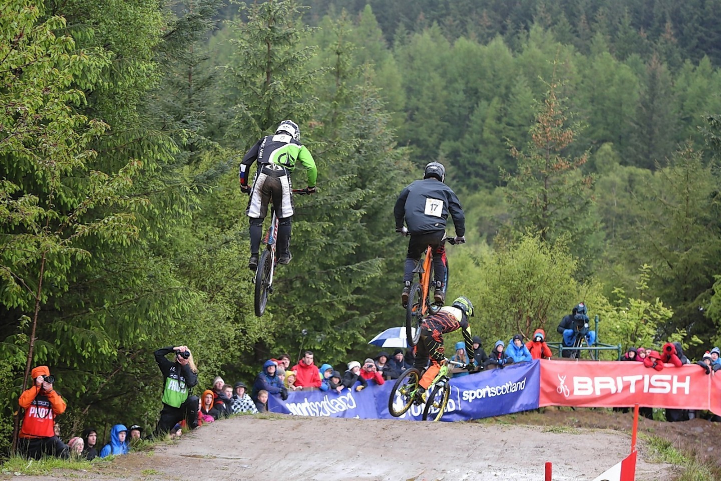 Riders compete on the 4X Pro Tour event at Fort William.