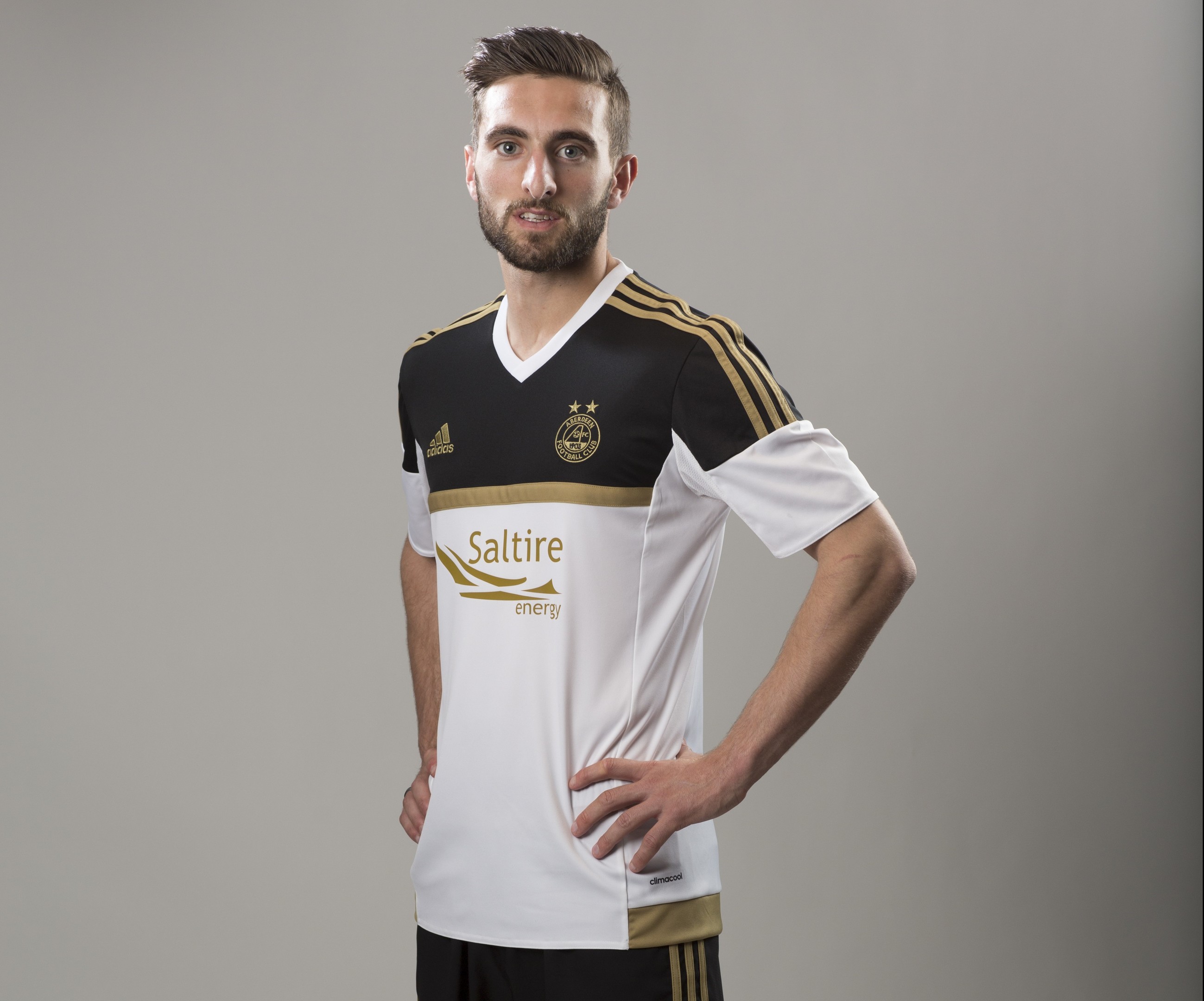 Graeme Shinnie poses in the Dons new away strip