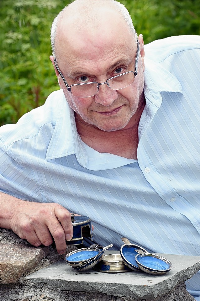 Lenny Bleakley, Bucksburn, Aberdeen, with a set of ashtrays from the HMS Lancastria