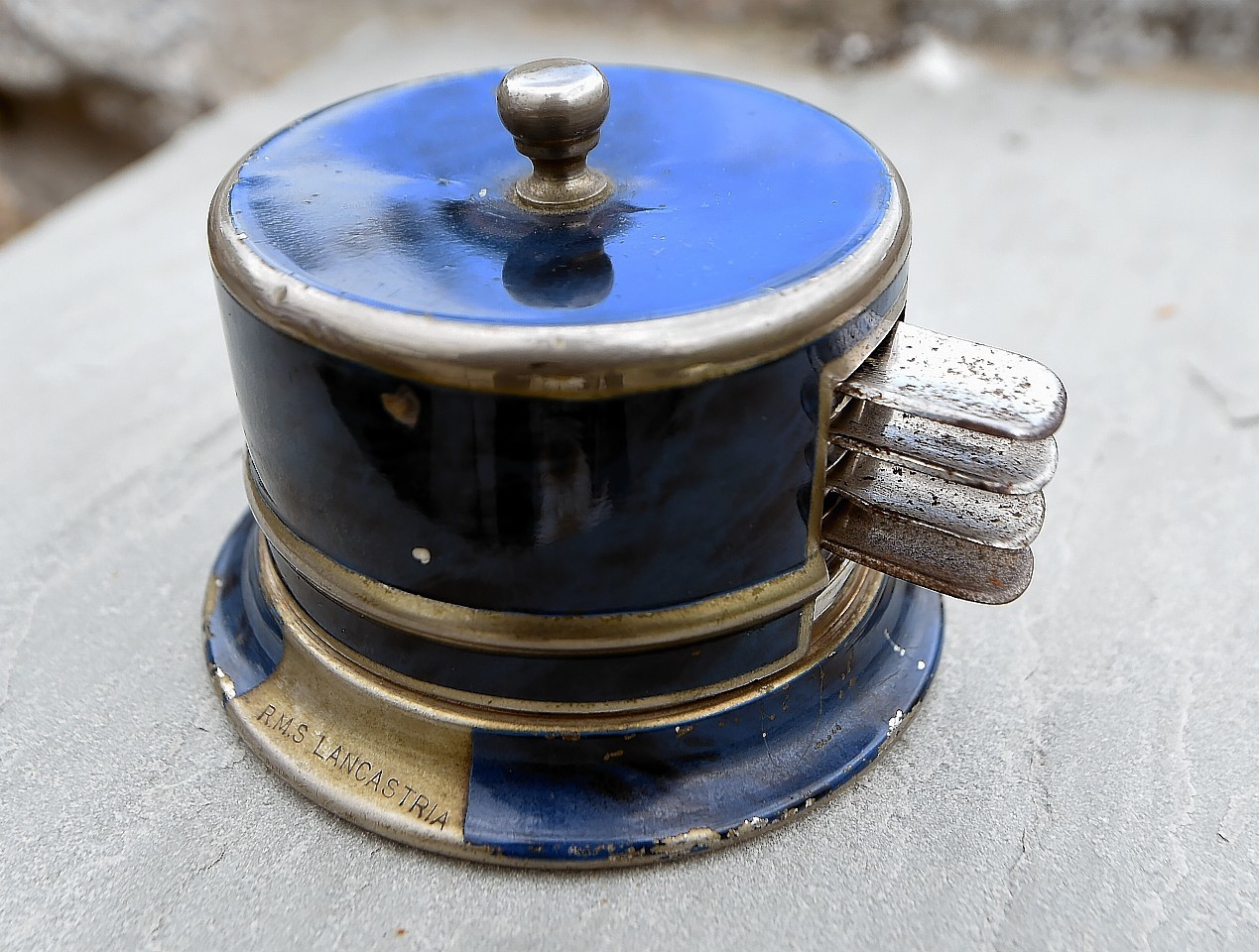 Lenny Bleakley, Bucksburn, Aberdeen, with a set of ashtrays from the HMS Lancastria