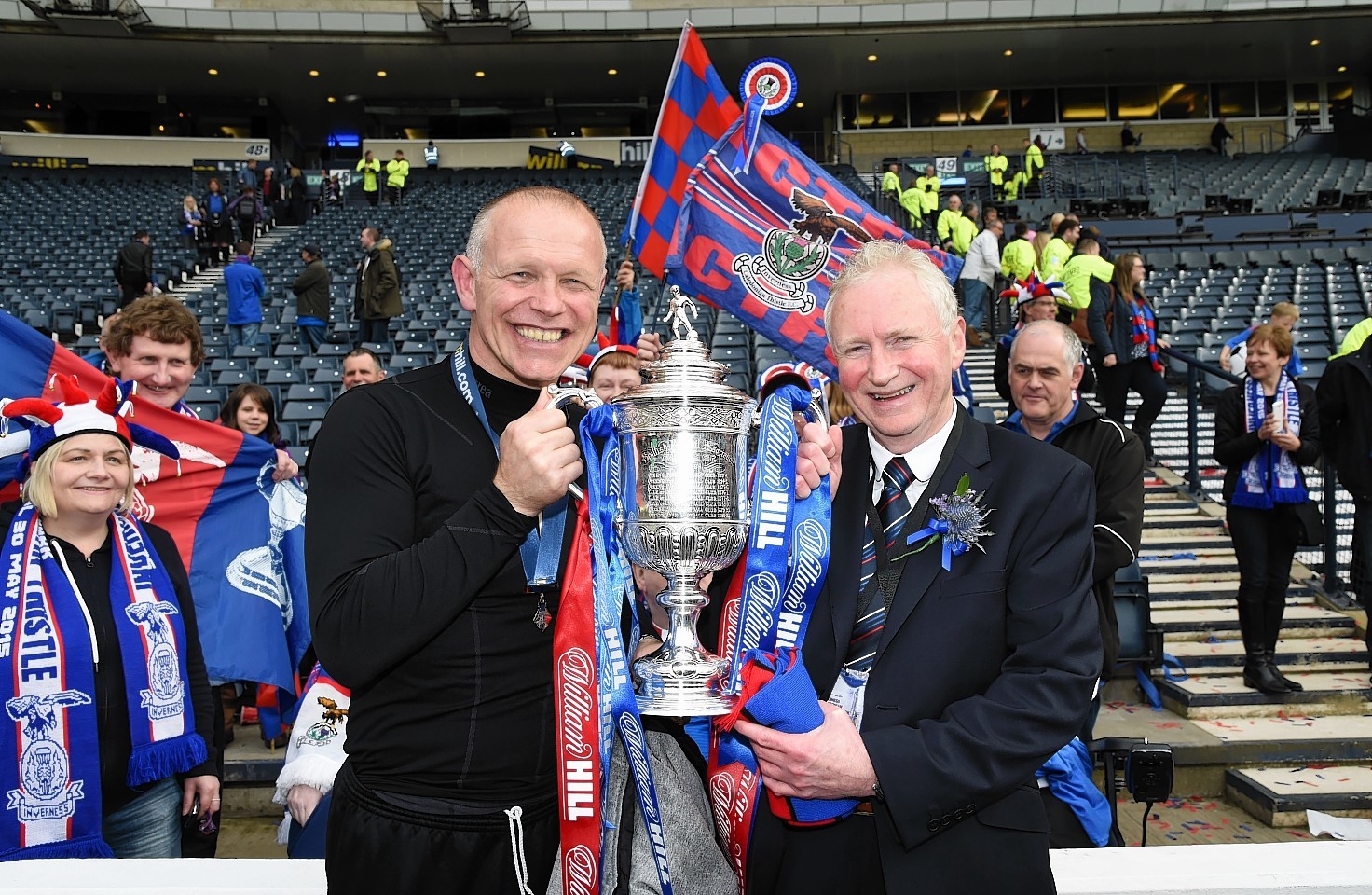 John Hughes and Kenny Cameron hold aloft the Scottish Cup just last May