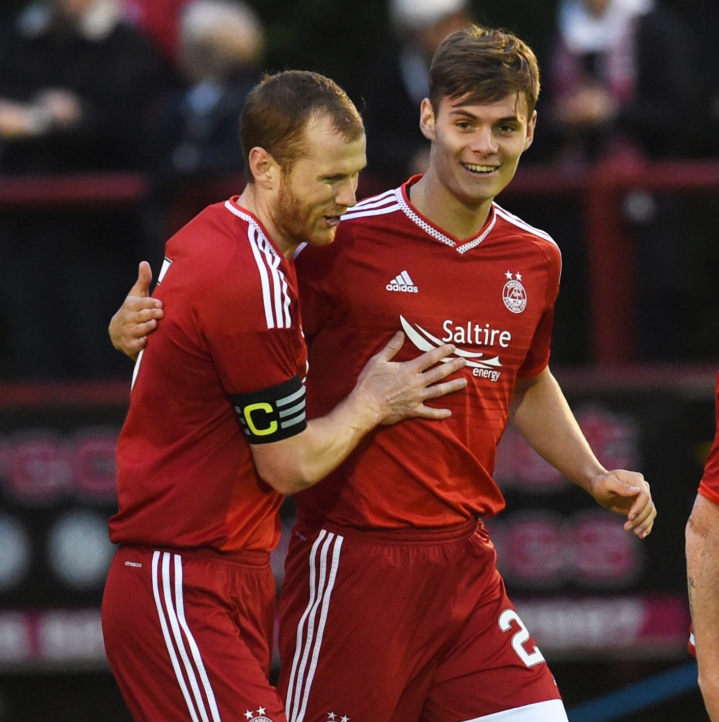 Michael Rose celebrates his goal with team-mate Mark Reynolds