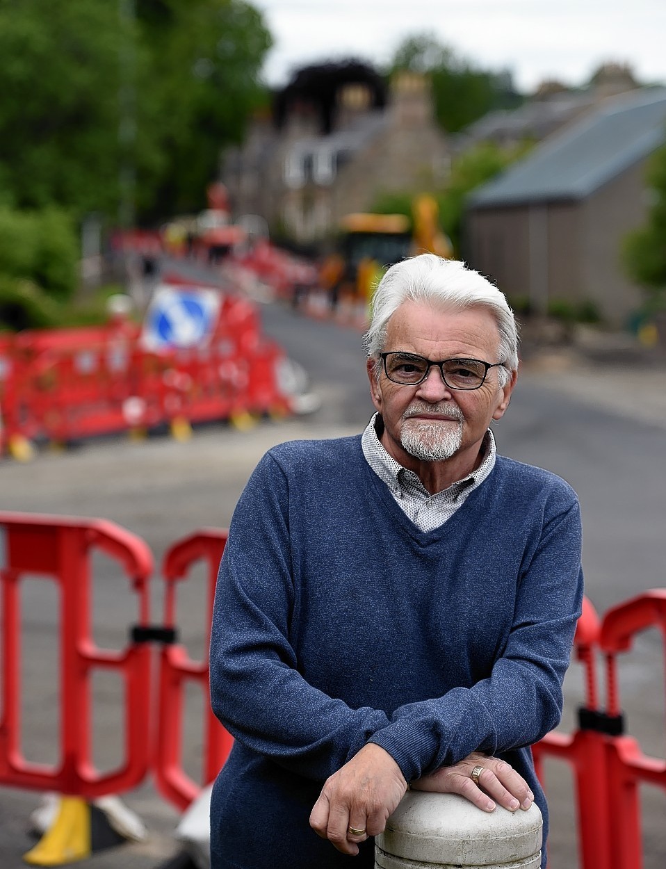 Ronnie Noble, Fresh On Spey, Aberlour beside the major roadworks in the village. Picture by Gordon Lennox