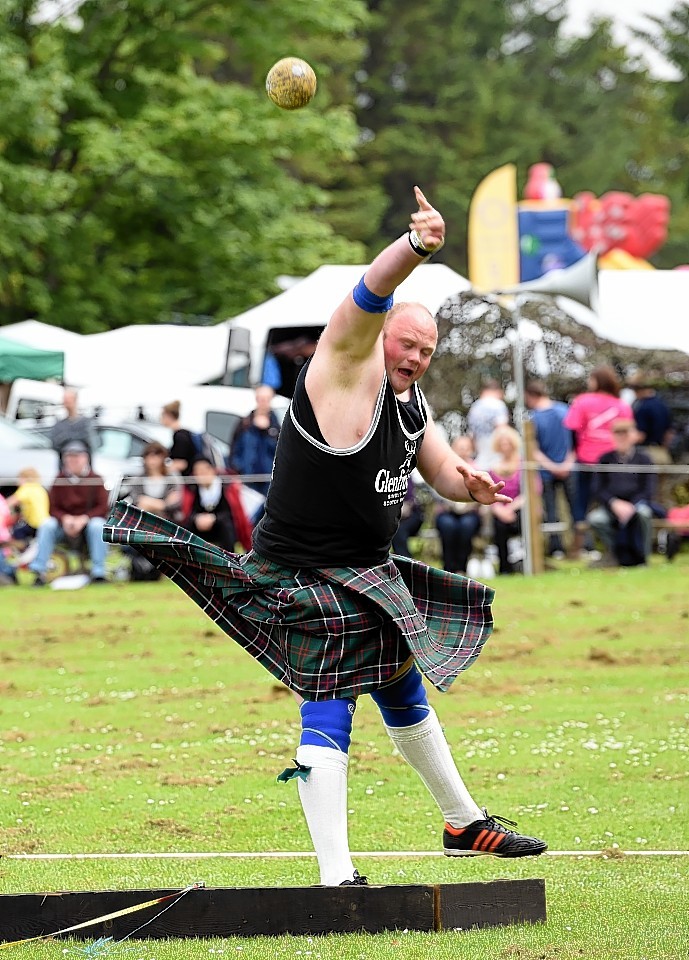 The annual Oldmeldrum sports day at oldmeldrum. In the picture is Craig Sinclair, Banchory, preparing for the shot putt