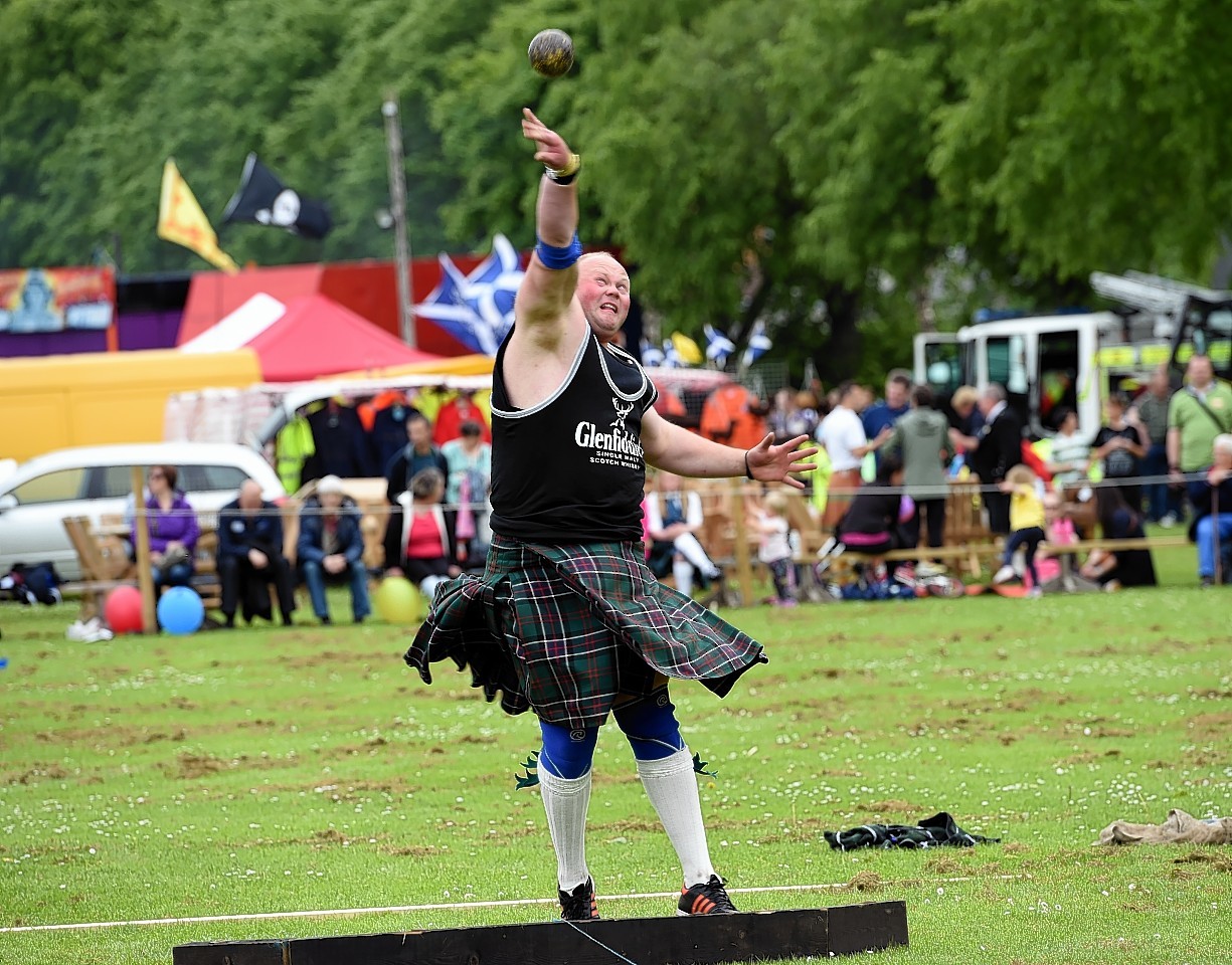 The annual Oldmeldrum sports day at oldmeldrum. In the picture is Craig Sinclair, Banchory, preparing for the shot putt