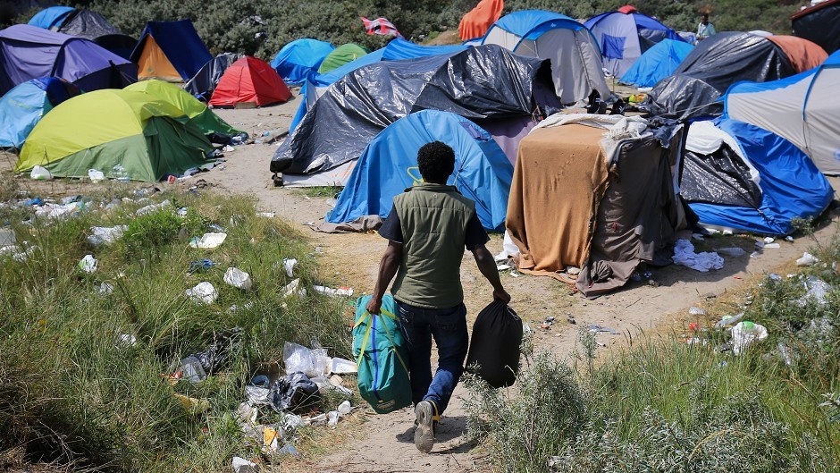 Migrants camp in squalid conditions in Calais