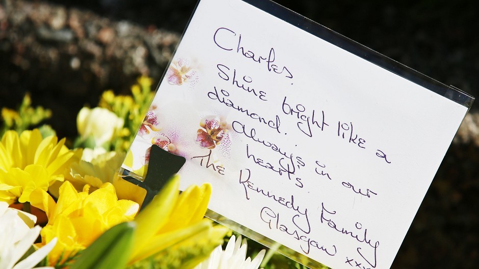 Flowers from the Kennedy family are placed outside St John the Evangelist church near Fort William