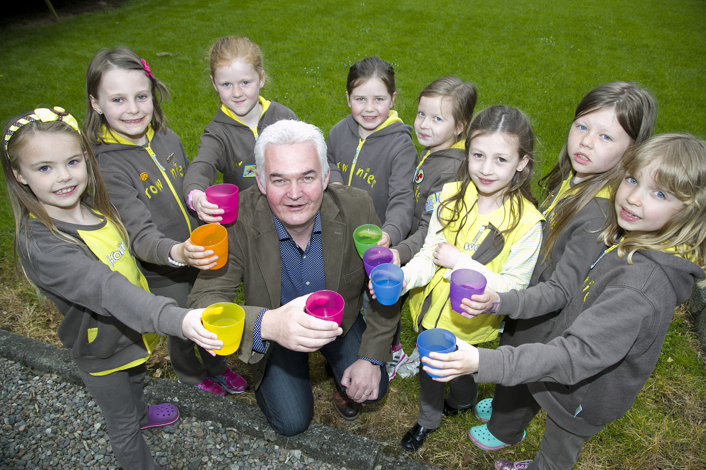 Guides and Brownies in Ellon benefited from last year's Ythan Challenge. Helping them celebrate was Paul McAlister of CETCO.