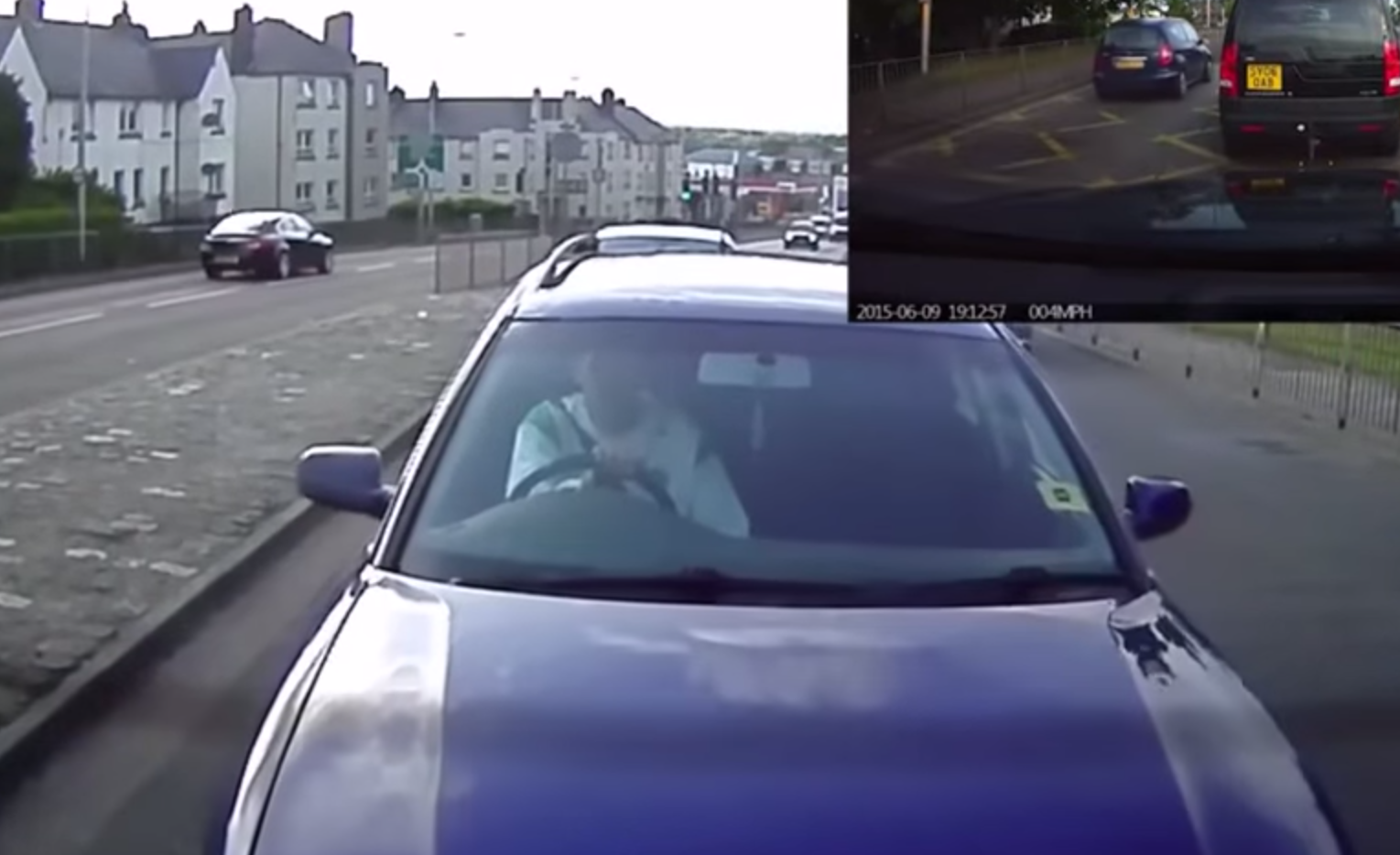 The moment the driver appears to shunt into the back of the car front