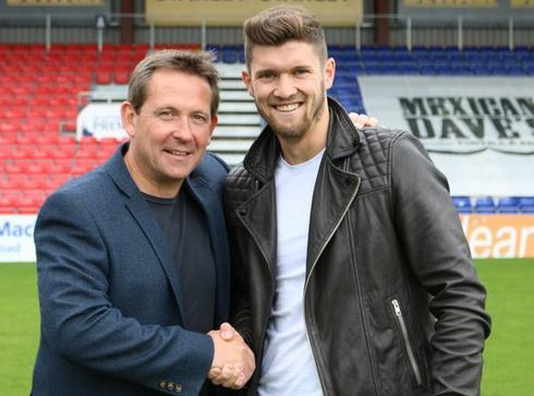 Stewart Murdoch shakes hands with County assistant Billy Dodds. Picture by Mags Matheson.