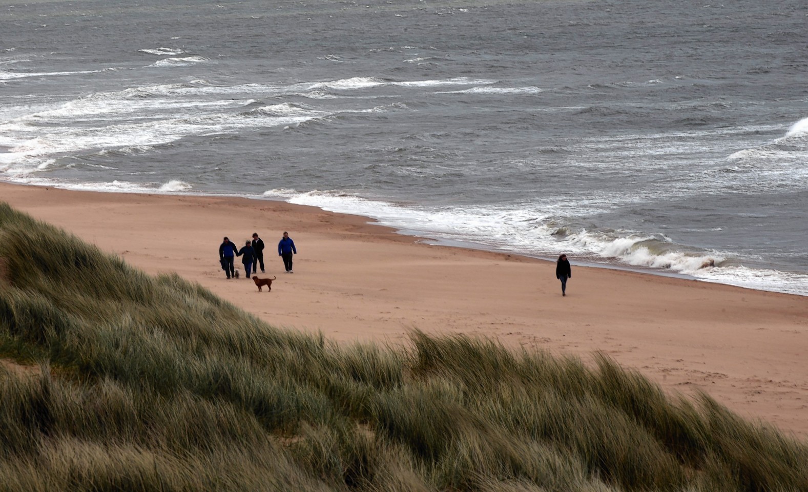Storm clouds and high winds gather this morning at Balmedie beach