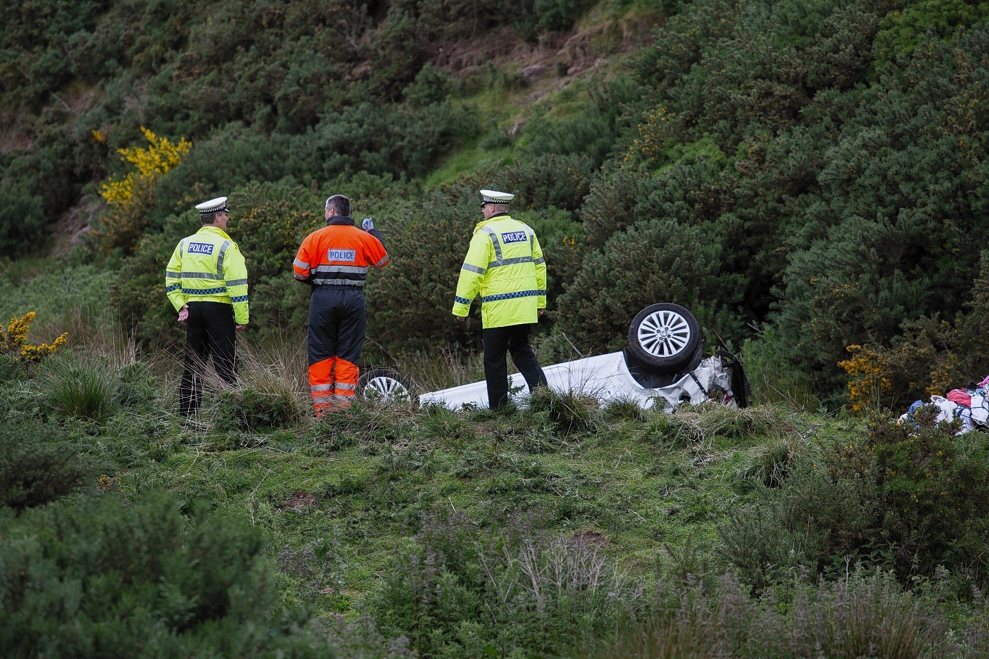 The car at the bottom of the embankment near Inverbervie