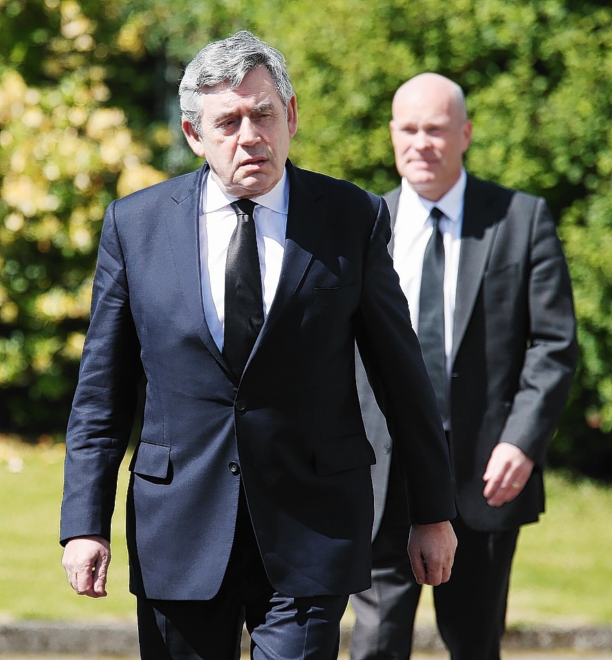 Former Prime Minister Gordon Brown arrives at St John the Evangelist church near Fort William 