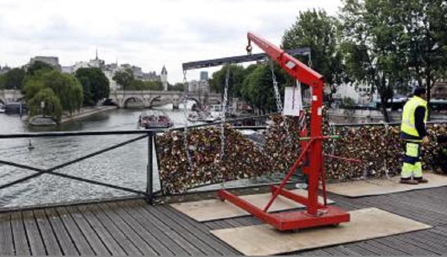 Thousands of padlocks affixed to the famed Pont des Arts bridge are being taken down