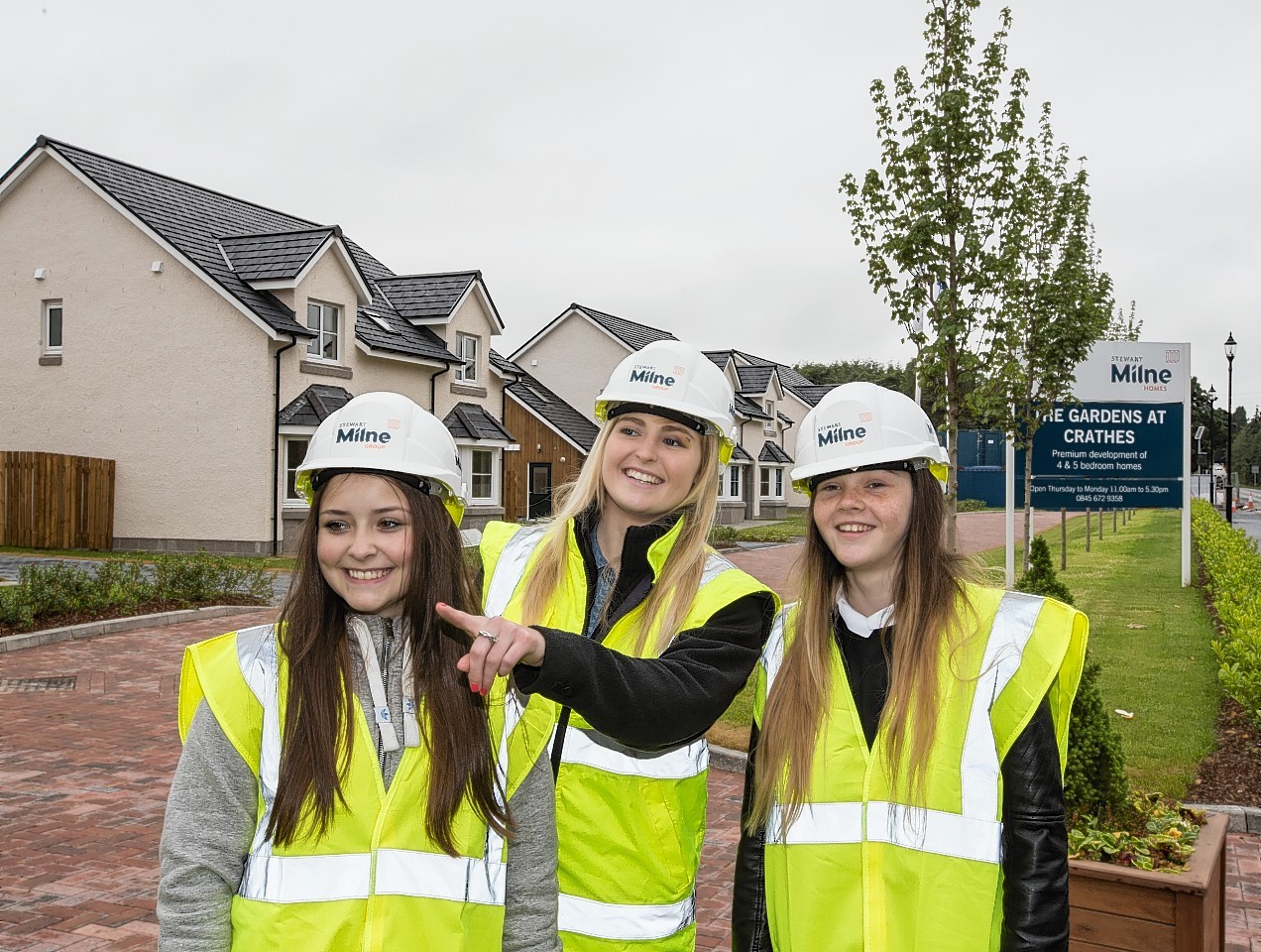 Apprentice quantity surveyor Abbie Duthie (centre) with pupils Natalia Lisowska (left) and Chloe Kelly (right)