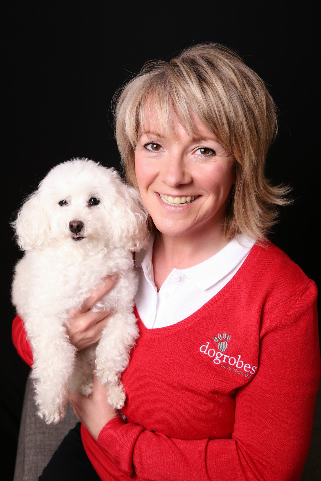 Dogrobes owner Margaret Reynolds with poodle Missy