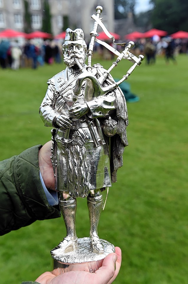 Silver on bronze statue of Queen Victoria's piper William Ross by artist Boehm. Picture by Kami Thomson