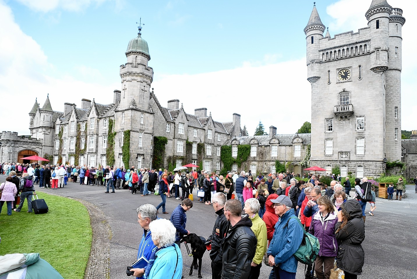 The crowds arrive as the BBC film the Antiques Roadshow episode at the Queen's Scottish residence, Balmoral Castle. Picture by Kami Thomson