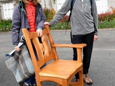 Denise and Tony Stott with a chair made for them by late wood artist Tim Stead       