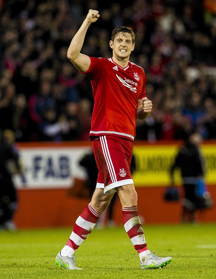 Ash Taylor salutes the fans after the match 