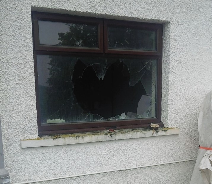 A beer keg beer keg was thrwon through the hotel's  front window