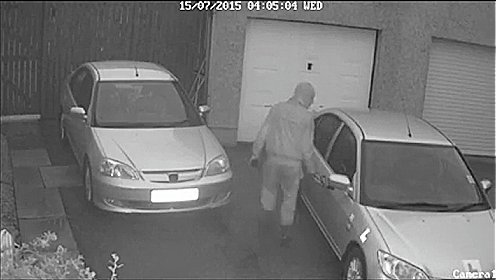 CCTV screen grabs of two prowlers trying the doors of cars in the Elrick area of Westhill.