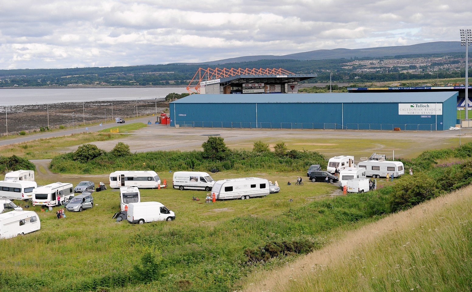 Travellers have made camp in the car park of the Caley Stadium in Inverness.