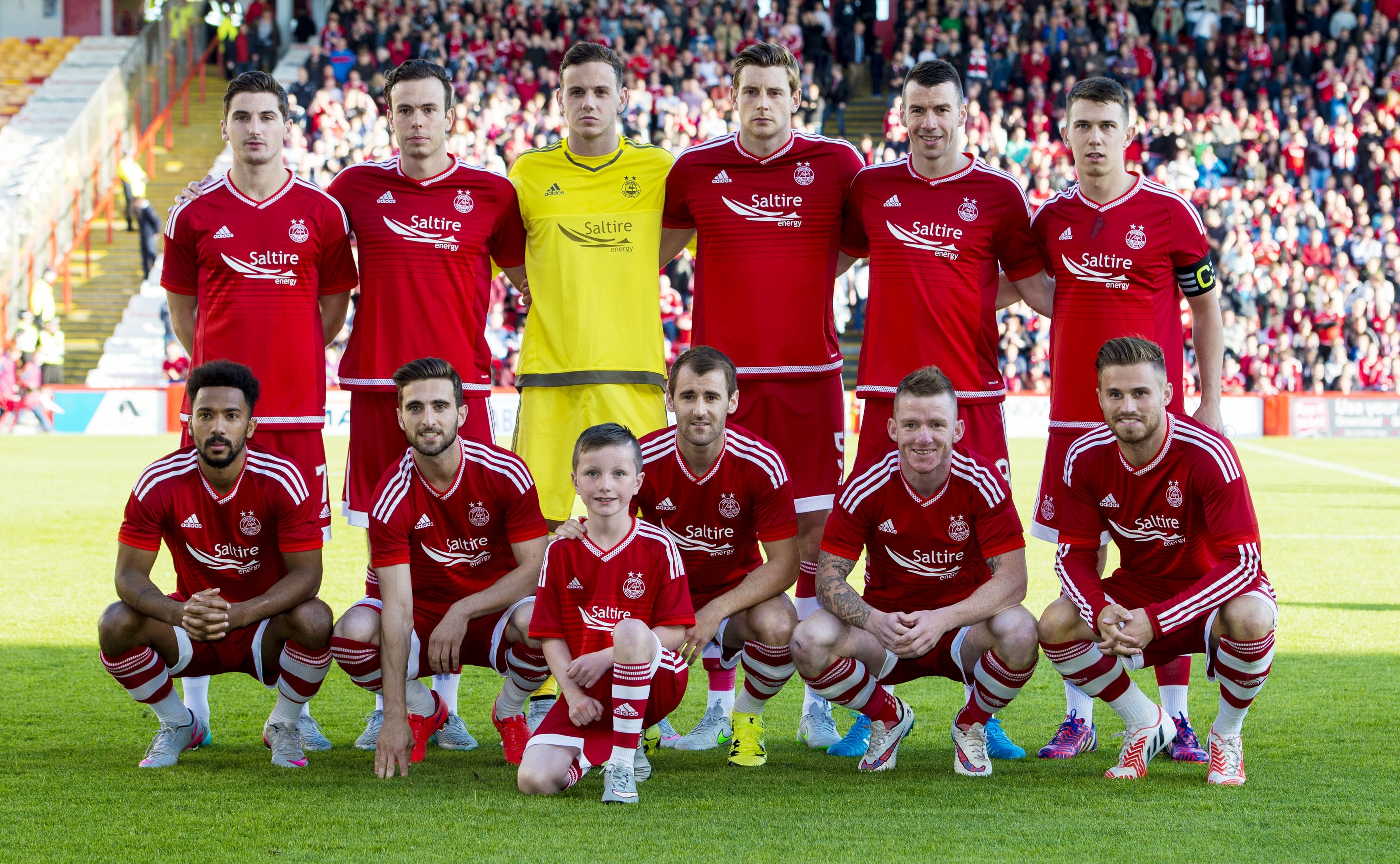 The Dons line up ahead of the match 