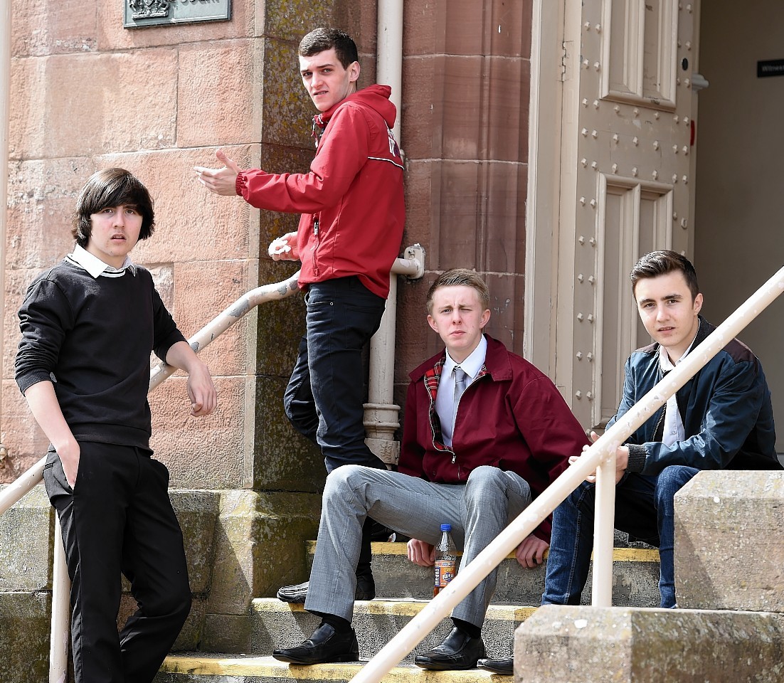 Four of the teenagers outside court: Kyle Etheridge, Ross Clark, Liam Fraser and Connor Etheridge.