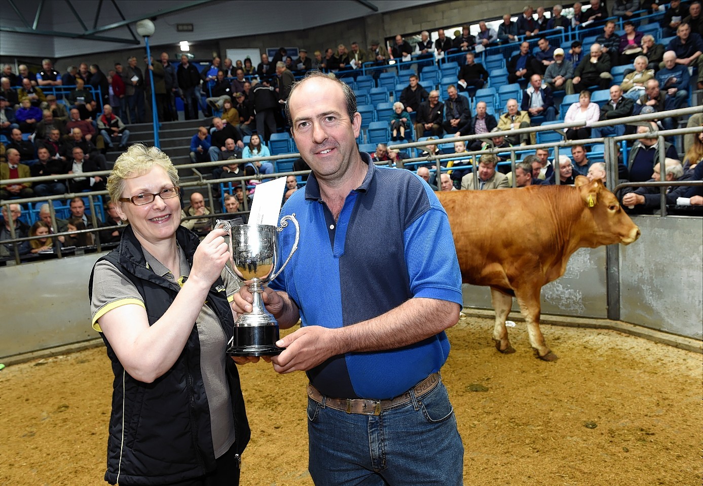 Gavin Greenlaw was presented with his trophy by Eileen Brown from show sponsor Turriff Agri Parts