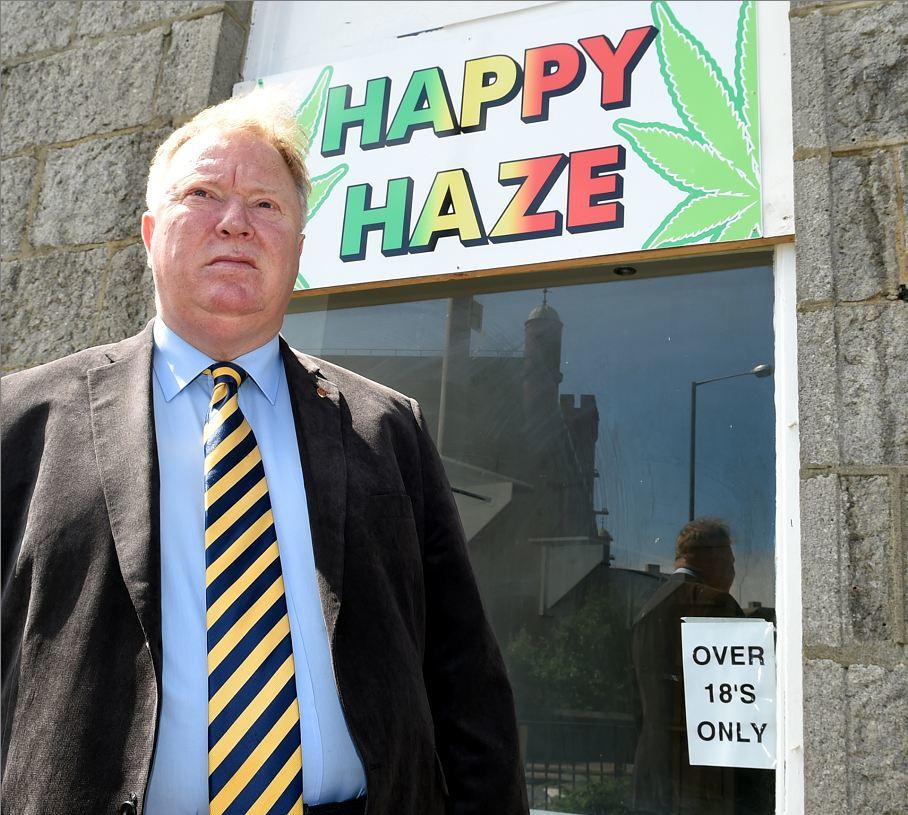 Councillor Bill Cormie outside the new Happy Haze shop