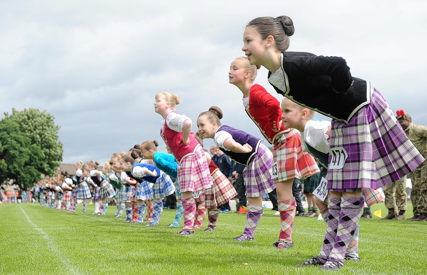 Young Highland Dancers perform a massed Highland Fling as part of the opening ceremony. Picture by Sandy McCook
