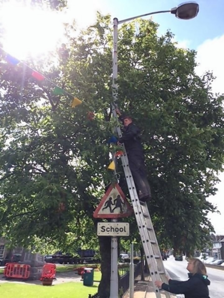 The volunteers had hung the bunting in an effort to brighten up the town 