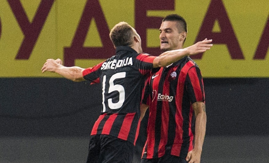 Hristijan Kirovski (right) celebrates his first leg goal with team-mate Blagoja Todorvski