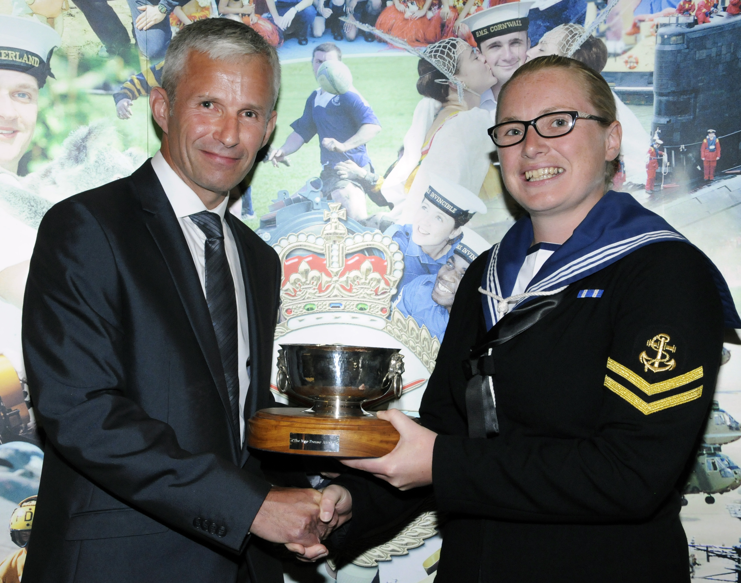 Lynsey Hay (right) receiving the The Nigel Prouse Award from Ritchie Killick.